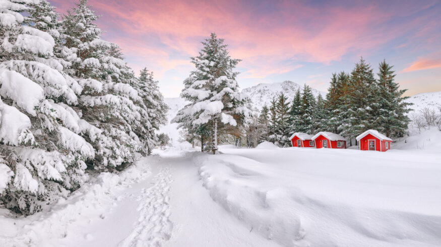 Stunning winter scenery with traditional Norwegian red wooden houses on the shore of Rolvsfjord on Vestvagoy island at Lofotens.  Location:  Vestvagoy, Rolvsfjord, Lofotens, Norway, Europe.