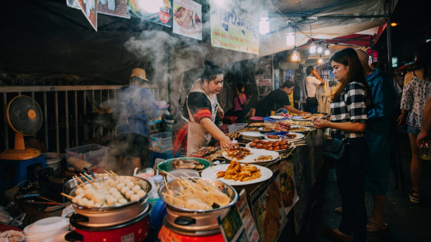 Explore the food of Thailand from markets - street, train, and floating - to a hands-on cooking class 